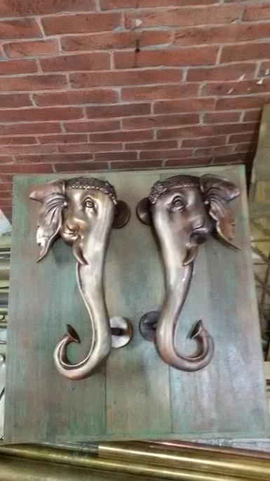 Elephant brass head handle price/set Item Code MPHD18 size long 30 cm wide 16.5 cm. Elephant brass head handle price/set Item Code MPHD18 size long 30 cm wide 16.5 cm.