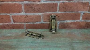 Window handle lock Item Code W.058 size long 55 mm. wide 23 mm. Window handle lock Item Code W.058 size long 55 mm. wide 23 mm.