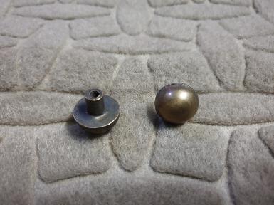 Brass Nail 19 mm.head Thickness 10 mm. AAMH19 size wide 19 mm head Thickness 10 mm leg high 8 mm. Brass Nail 19 mm.head Thickness 10 mm. AAMH19 size wide 19 mm head Thickness 10 mm leg high 8 mm.