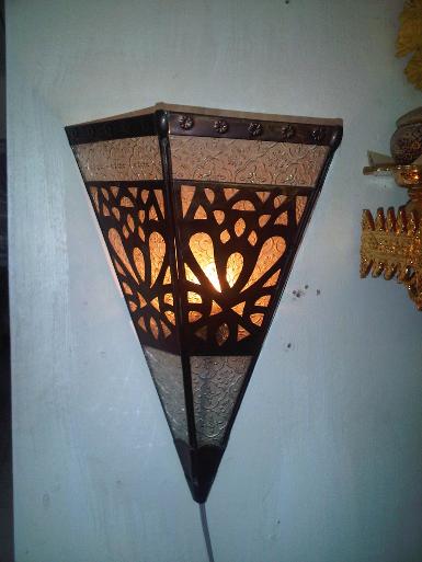 Morocco wall lamp brass with caving Item Code WL49J size wide 27 cm. high 35 cm. Morocco wall lamp brass with caving Item Code WL49J size wide 27 cm. high 35 cm.