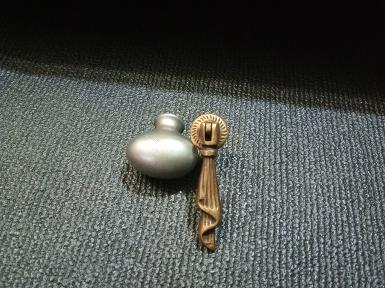 Brass handle Item Code E.011 size long 65 mm. wide 19 mm. Brass handle Item Code E.011 size long 65 mm. wide 19 mm.